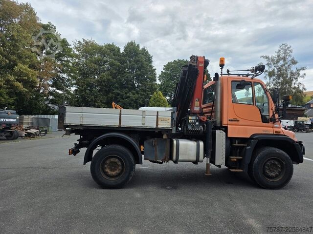 Outro UNIMOG U 500 3-Seiten-Kipper mit Kran PK 9501