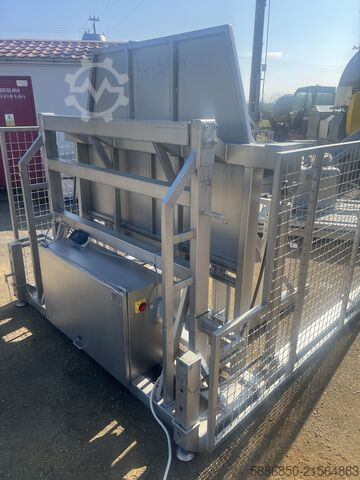 Volteador de bidones y cajas paletizables  