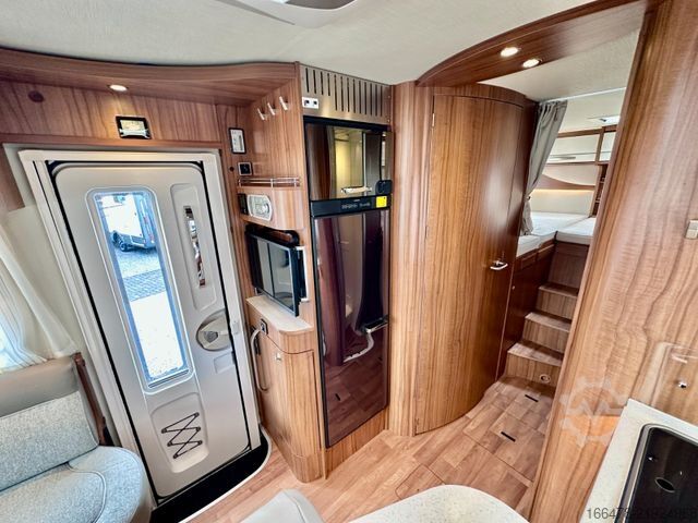 Teilintegriertes Wohnmobil HYMER/ERIBA Tramp T 704 SL *d*