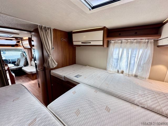 Teilintegriertes Wohnmobil HYMER/ERIBA Tramp T 704 SL *d*