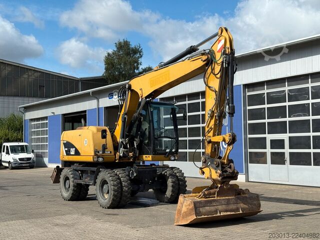 Hjulgrävare CATERPILLAR M313D Mobilbagger 14,2 Tonnen