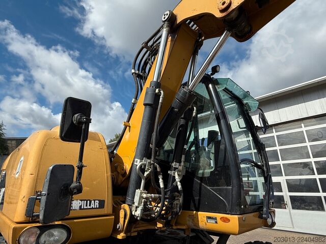 Hjulgrävare CATERPILLAR M313D Mobilbagger 14,2 Tonnen