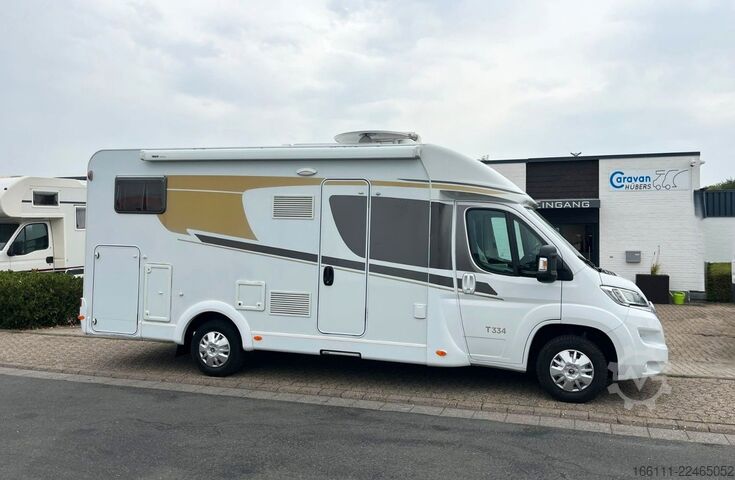 Teilintegriertes Wohnmobil CARADO T 334 - Hub/Einzelbetten -  - Klima