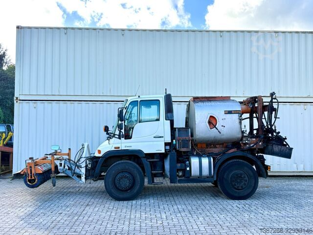 Dostosowany van UNIMOG U400 mit Breining U2000 Bitumenspritze + Besen
