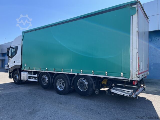 Autocarro con pianale e telone Iveco Stralis 480