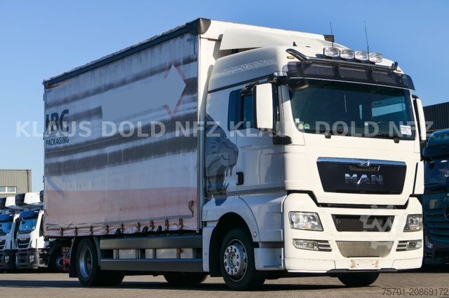 Flatbed truck with tarp MAN TGX 18.400 Pritsche Plane Retarder 2-Tanks