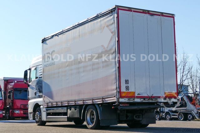 Flatbed truck with tarp MAN TGX 18.400 Pritsche Plane Retarder 2-Tanks
