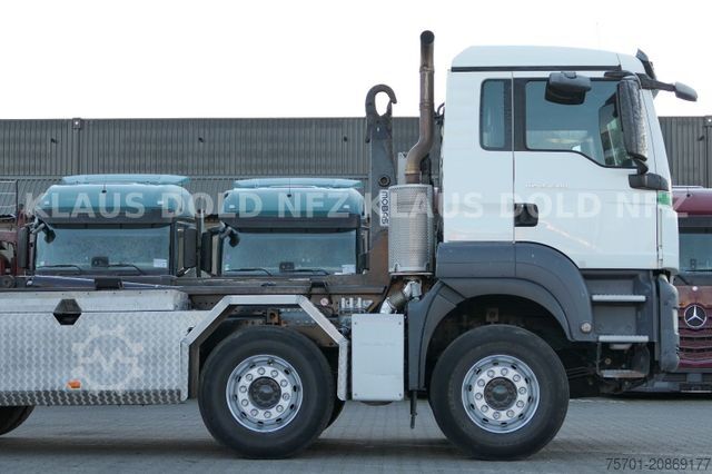 Kanca kasalı yük kamyonu (roll-off) MAN TGS 35.500 Abrollkipper Mobas Retarder 8x4 Euro6