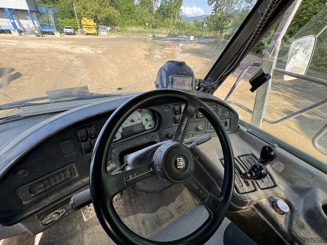 Dömper caterpillar 725