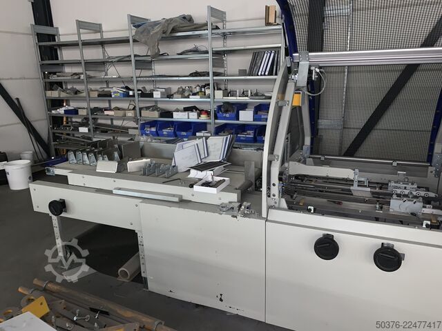 Ligne de traitement entièrement automatisée pour boîtes en carton rigide jusqu'à 400 cycles/heure Kolbus fully equiped BoxLine SW series