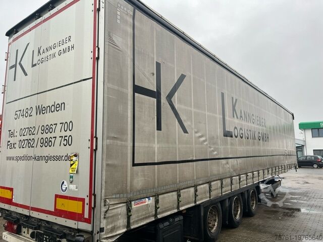 Przyczepa z płaską platformą i plandeką Schmitz Cargobull Mega Chasssi verzinkt