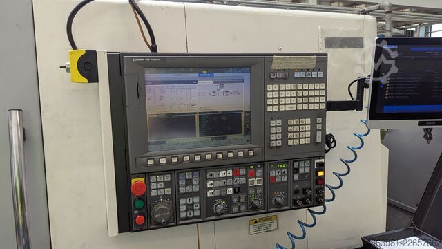 Torno CNC com alimentador de barras OKUMA L300-MW