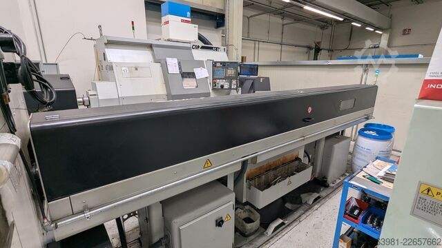 Torno CNC com alimentador de barras OKUMA L300-MW