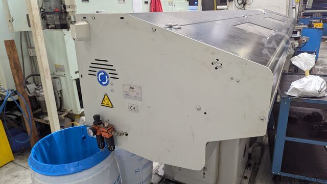 Torno CNC com alimentador de barras OKUMA L300-MW