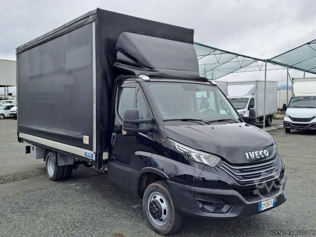 Flatbed truck with tarp IVECO DAILY 35C18 3.0 - 4100