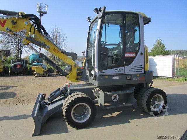 Hjulgrävare Neuson EW 65 - Martin-POWERTILT + Schnellw.+ 4 Löffel