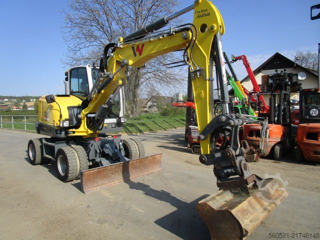 Hjulgrävare Neuson EW 65 - Martin-POWERTILT + Schnellw.+ 4 Löffel