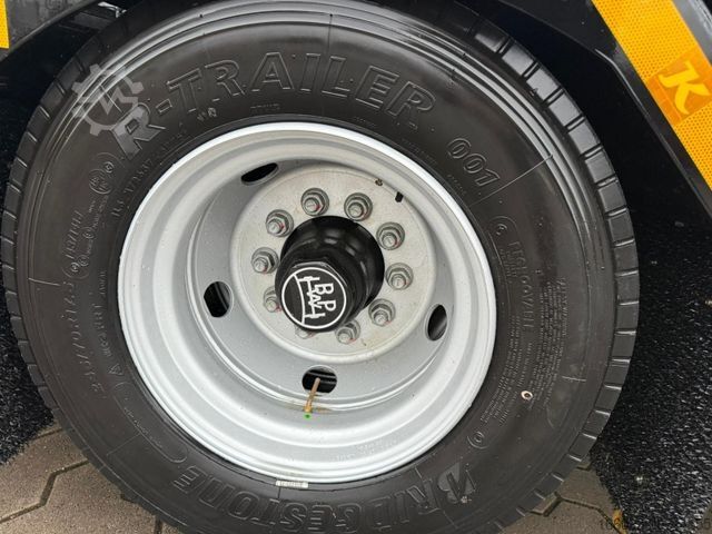 Semiremorcă cu platformă joasă KÄSSBOHRER K.SLA R 4 / 2N 18/40 Tieflader Radmulden tele