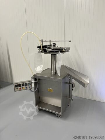 Macchina per riempimento e sigillatura di sacchi H. Jouhsen Bag filling and sealing machine