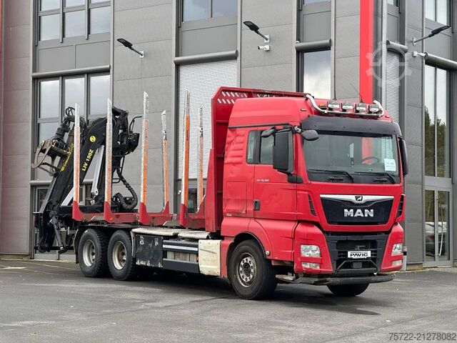 Timber transporter MAN TGX 26.500 6x4 BL Kurzholz TajfunLIV 150Z 9,6