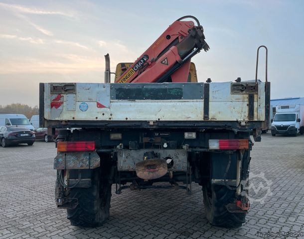 Vrachtauto met open laadbak UNIMOG U 5000 Doka Pritsche/ PK 10.502 A/ AC/ AHK/ EU 3