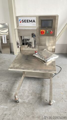 Umplere automată a pungilor în cutii SEEMA 
