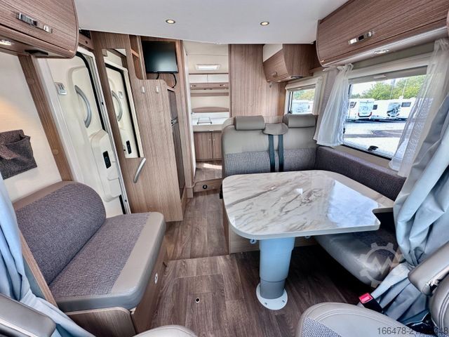 Teilintegriertes Wohnmobil CARADO T 449 *Queensbett-Hubbett-Sat-TV*