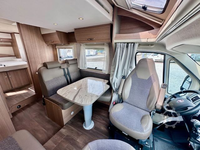 Teilintegriertes Wohnmobil CARADO T 449 *Queensbett-Hubbett-Sat-TV*