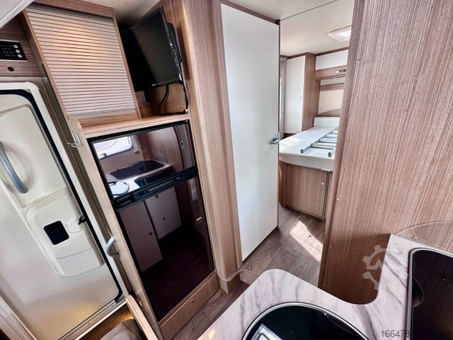Teilintegriertes Wohnmobil CARADO T 449 *Queensbett-Hubbett-Sat-TV*
