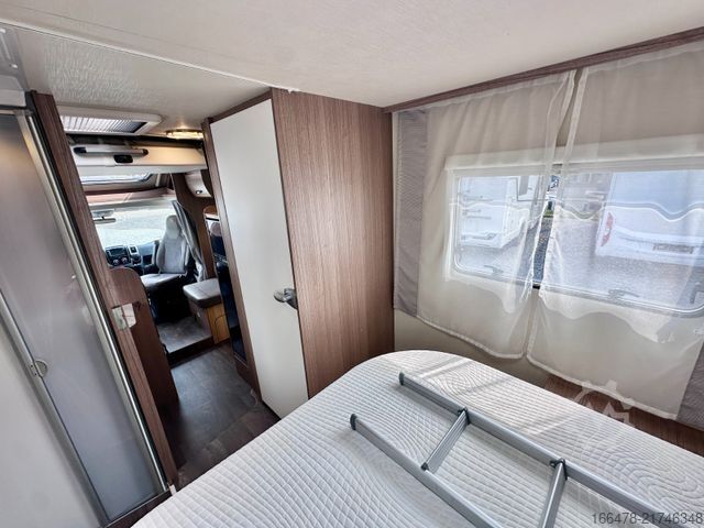 Teilintegriertes Wohnmobil CARADO T 449 *Queensbett-Hubbett-Sat-TV*