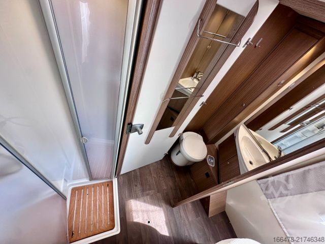 Teilintegriertes Wohnmobil CARADO T 449 *Queensbett-Hubbett-Sat-TV*