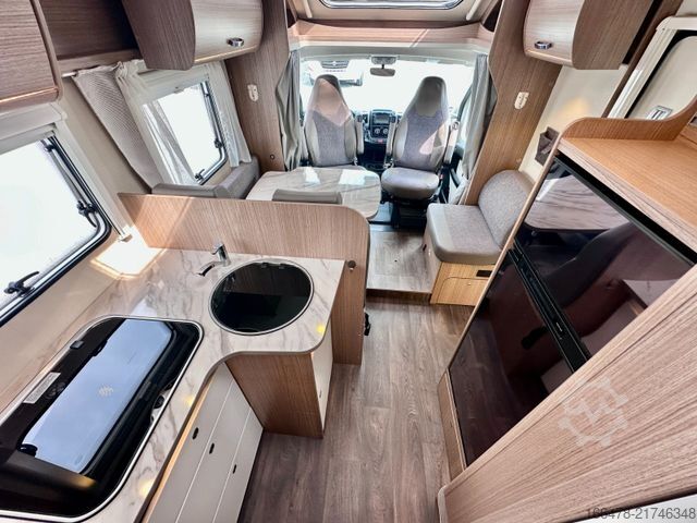 Teilintegriertes Wohnmobil CARADO T 449 *Queensbett-Hubbett-Sat-TV*