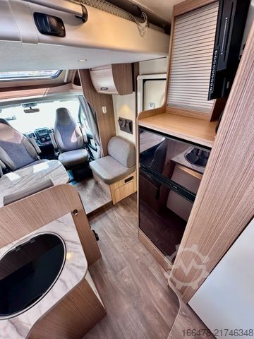 Teilintegriertes Wohnmobil CARADO T 449 *Queensbett-Hubbett-Sat-TV*