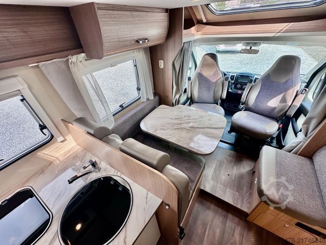 Teilintegriertes Wohnmobil CARADO T 449 *Queensbett-Hubbett-Sat-TV*