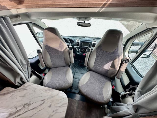 Teilintegriertes Wohnmobil CARADO T 449 *Queensbett-Hubbett-Sat-TV*