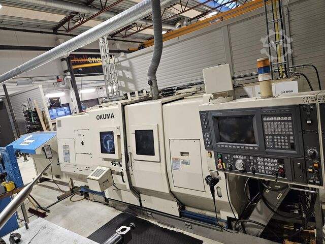 CNC lathe Okuma LU 15 M U1000 MM + bar feeder TwinTurret