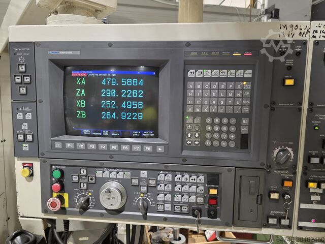 CNC lathe Okuma LU 15 M U1000 MM + bar feeder TwinTurret