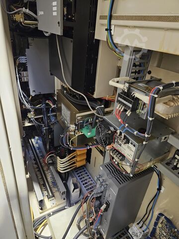 CNC lathe Okuma LU 15 M U1000 MM + bar feeder TwinTurret