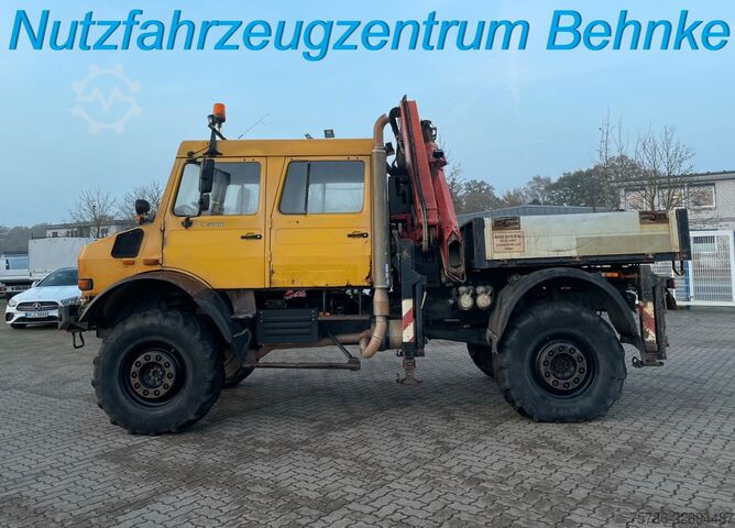 Lastbilsmonterad kran UNIMOG U 5000 Doka Pritsche/ PK 10.502 A/ AC/ AHK/ EU 3