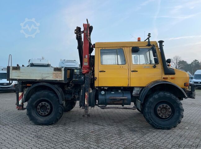 Lastbilsmonterad kran UNIMOG U 5000 Doka Pritsche/ PK 10.502 A/ AC/ AHK/ EU 3
