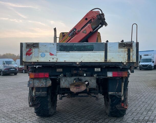 Lastbilsmonterad kran UNIMOG U 5000 Doka Pritsche/ PK 10.502 A/ AC/ AHK/ EU 3