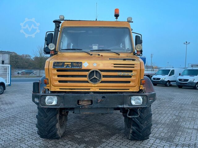 Lastbilsmonterad kran UNIMOG U 5000 Doka Pritsche/ PK 10.502 A/ AC/ AHK/ EU 3