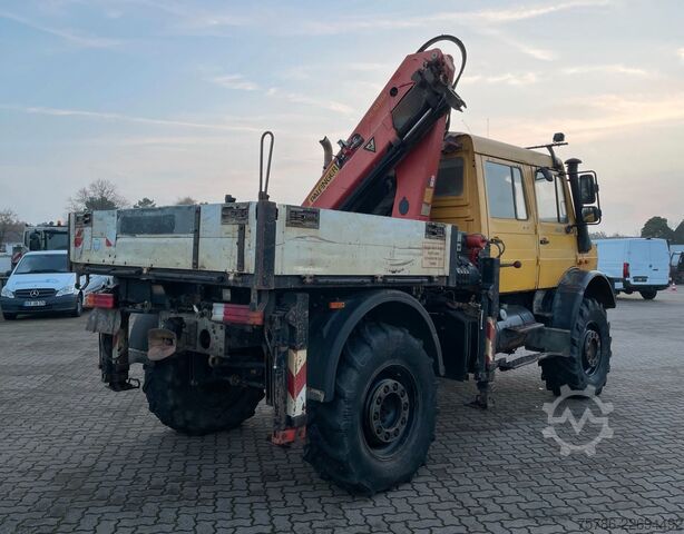 Lastbil med flak UNIMOG U 5000 Doka Pritsche/ PK 10.502 A/ AC/ AHK/ EU 3