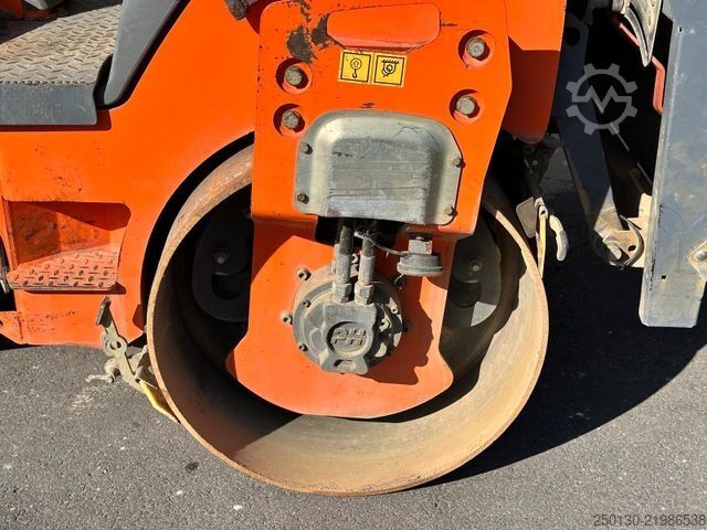 Enkelvoudige trommelwals HAMM HD12 VV Tandemwalze mit Streuer