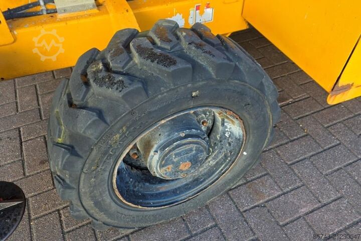 Scissor lift Haulotte H12SXL As-Is, Diesel, 4x4 Drive, 12m Working Heigh