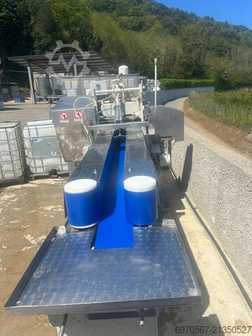 Mašina za pakovanje tunjevine - punilica i pakirnica  