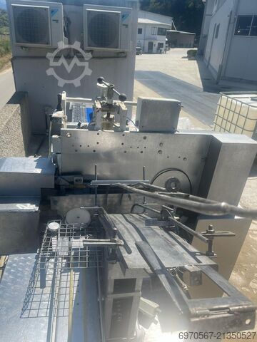 Mašina za pakovanje tunjevine - punilica i pakirnica  