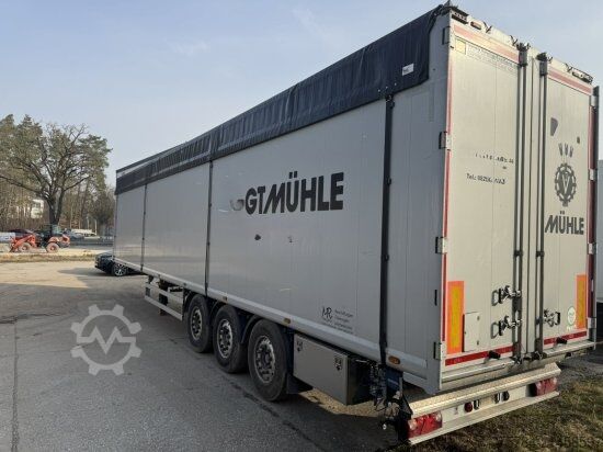 Semiremorcă cu podea mobilă KRAKER 3-ACHS SCHUBBODENAUFLIEGER CF-Z