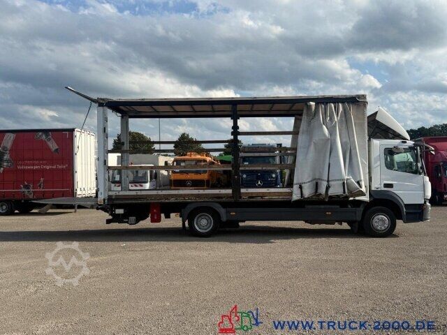 Samochód ciężarowy z plandeką typu platforma Mercedes-Benz Atego 1224 Schiebeplane L+R+ Dach LBW 1.5T AHK