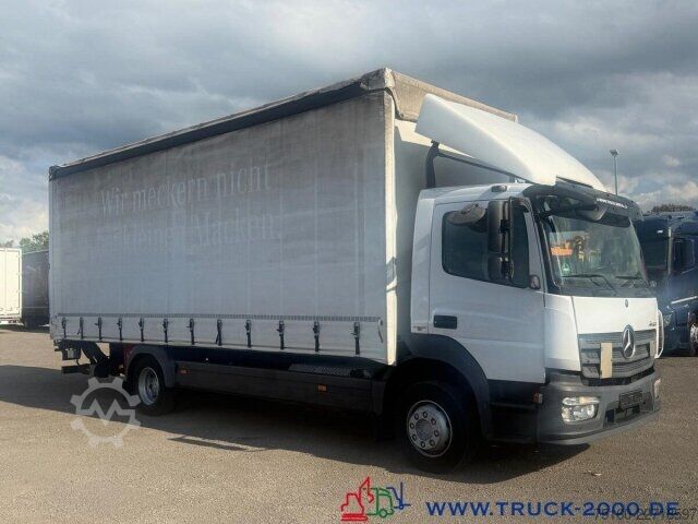 Samochód ciężarowy z plandeką typu platforma Mercedes-Benz Atego 1224 Schiebeplane L+R+ Dach LBW 1.5T AHK